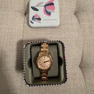 Rose gold Fossil watch. Additional links included to expand wrist band.